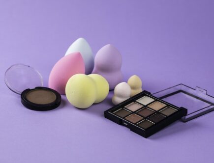 Makeup Products on Purple Surface